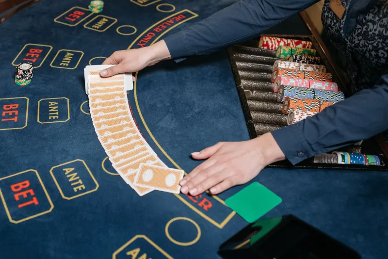 Mates, Tells, and Webcams: Bringing Bush Poker Smarts to the Live Dealer Table